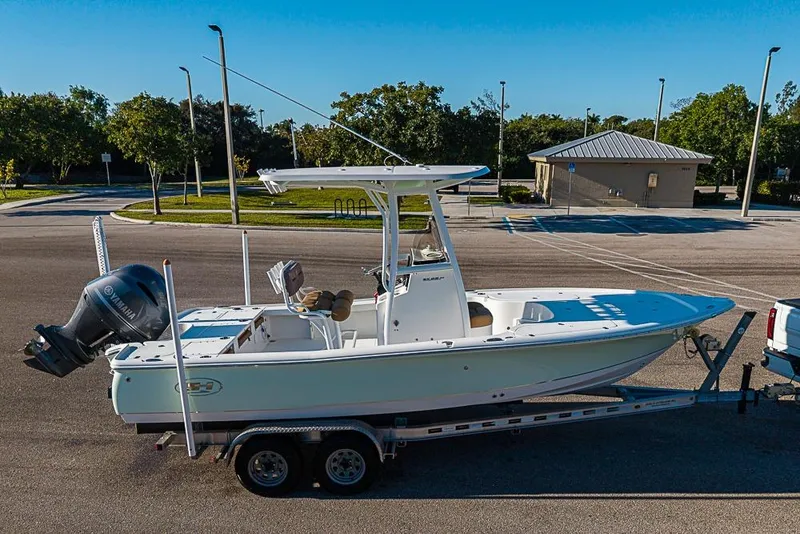 Slide: The Image of 2019 Sea Hunt BX 22 BR boat on trailer in parking lot. - 44