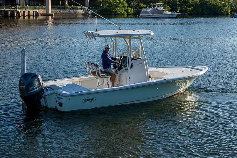 Slide: The Image of 2019 Sea Hunt BX 22 BR boat on water with Yamaha engine. - 5