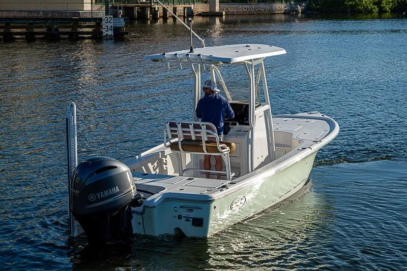 Slide: The Image of 2019 Sea Hunt BX 22 BR boat with Yamaha engine on calm water. - 7