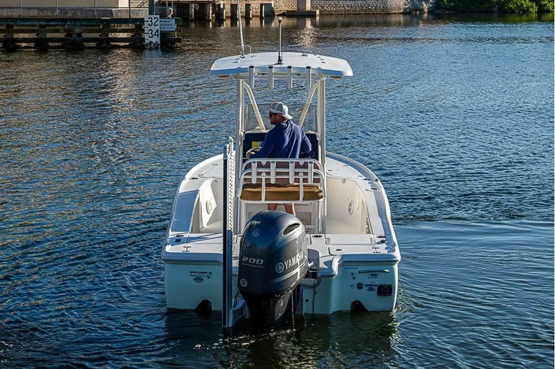 Slide: The Image of 2019 Sea Hunt BX 22 BR boat with Yamaha engine on calm water. - 8