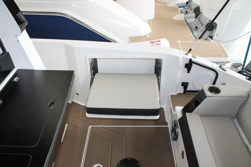 Slide: The Image of Interior of 2026 Navan C30 boat featuring seating and storage area. - 20