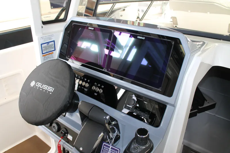 Slide: The Image of Steering console of 2026 Navan C30 boat with advanced navigation system and controls. - 28