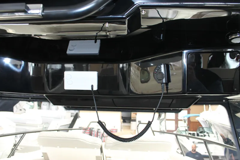 Slide: The Image of Interior view of a 2026 Navan C30 boat, featuring a sleek black control panel. - 29