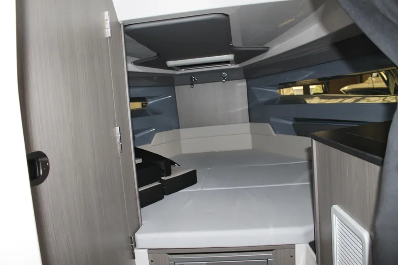 Slide: The Image of Interior cabin of 2026 Navan C30 boat, featuring modern design and comfortable sleeping area. - 30