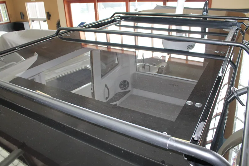 Slide: The Image of Rooftop view of 2026 Navan C30 boat interior through glass panel. - 35