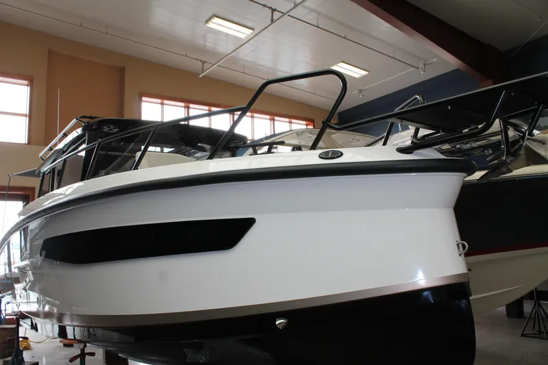 The Image of 2026 Navan C30 boat displayed indoors, showcasing sleek design and modern features. - 9