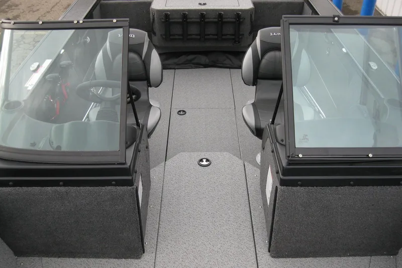 Slide: The Image of 2026 Lund 1875 Fisherman boat interior with dual consoles and seating. - 21