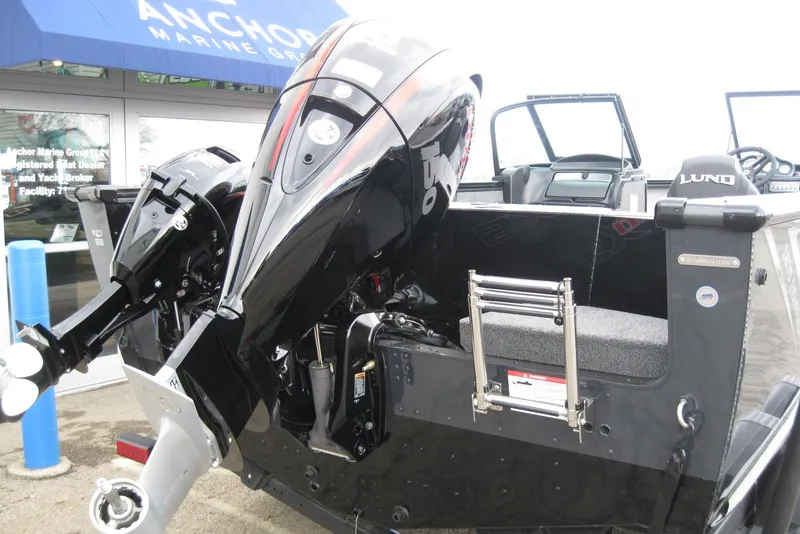 Slide: The Image of 2026 Lund 1875 Fisherman boat with powerful outboard motor at Anchor Marine Group. - 5