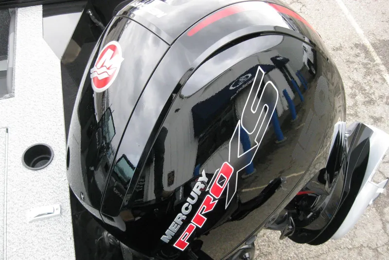 Slide: The Image of 2026 Lund 1875 Fisherman with Mercury Pro XS outboard motor, close-up view. - 7