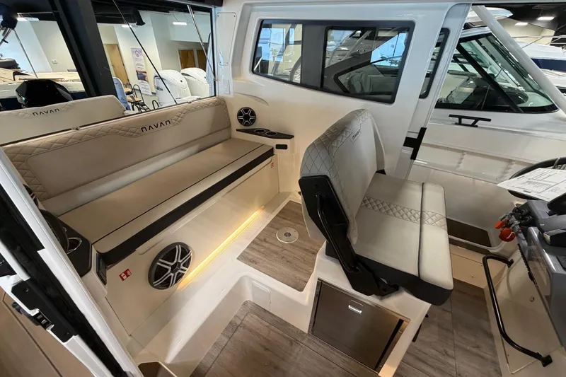 Slide: The Image of Interior of 2026 Navan C30 boat with beige seating and modern design. - 14