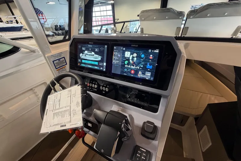 Slide: The Image of Interior cockpit of 2026 Navan C30 boat with advanced navigation displays. - 16
