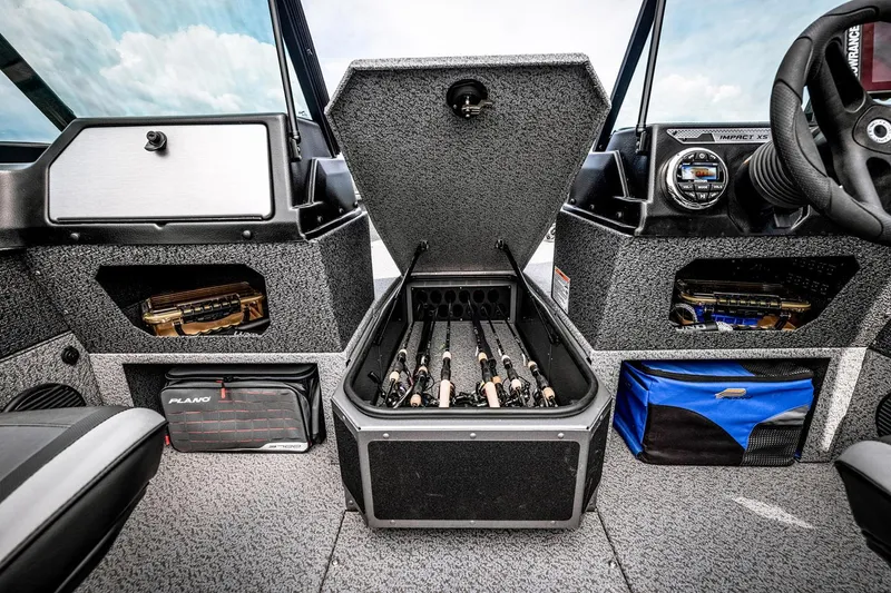 Slide: The Image of Manufacturer Provided Image: 2025 Lund 1775 Impact XS Sport boat interior with fishing rod storage. - 16