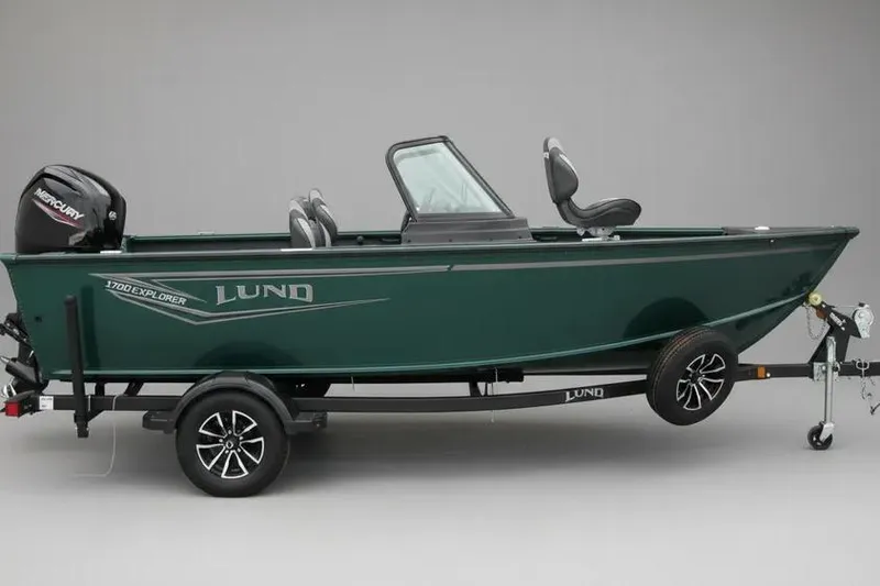 The Image of 2026 Lund 1700 Explorer Sport boat on trailer, side view, green exterior. - 0