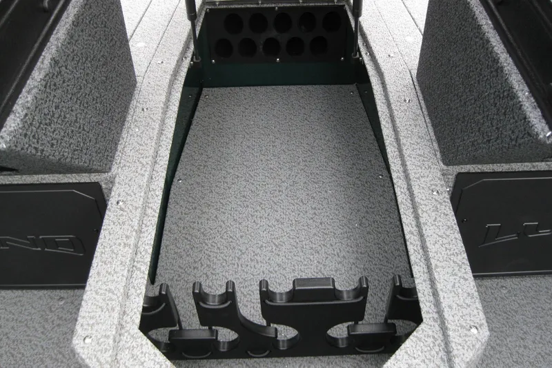 Slide: The Image of 2026 Lund 1700 Explorer Sport boat interior with rod storage compartment. - 18
