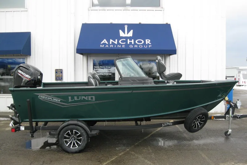 Slide: The Image of 2026 Lund 1700 Explorer Sport boat on trailer at Anchor Marine Group. - 2