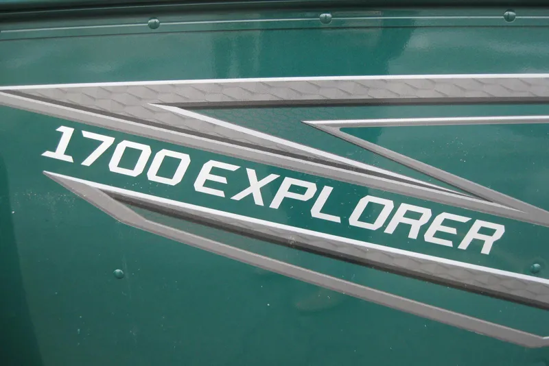 Slide: The Image of 2026 Lund 1700 Explorer Sport boat logo on green background. - 5