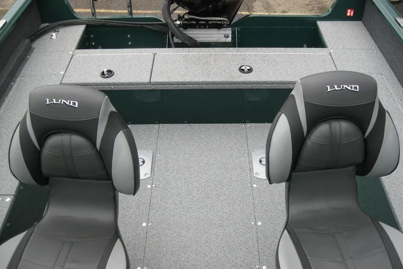 Slide: The Image of 2026 Lund 1700 Explorer Sport boat interior with two cushioned seats. - 9