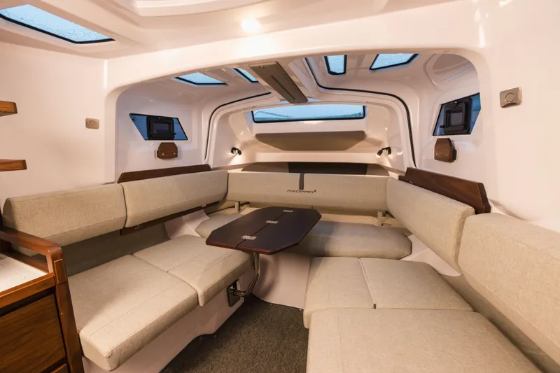 Slide: The Image of Modern sink with black faucet in 2026 Axopar 38 Cross Cabin boat interior. - 20