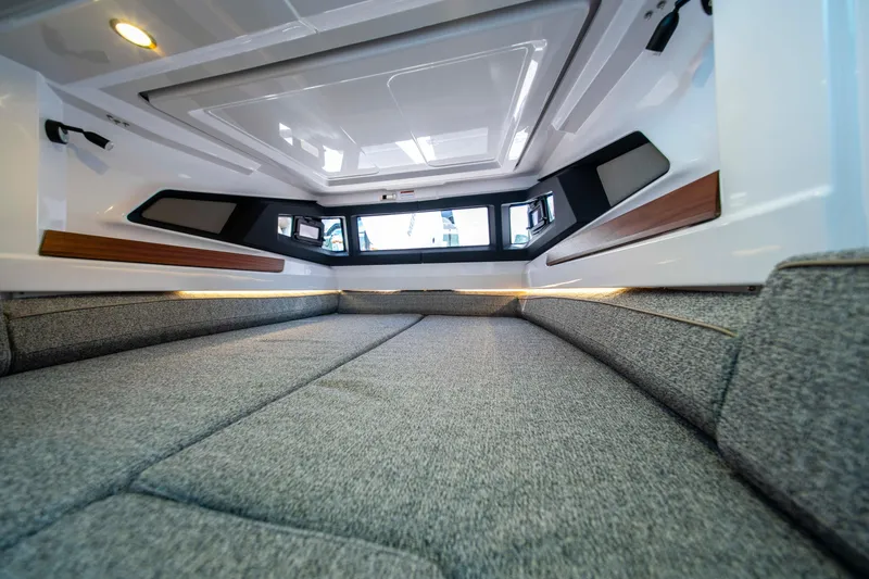 Slide: The Image of 2026 Axopar 38 Cross Cabin interior with modern design and comfortable seating. - 31