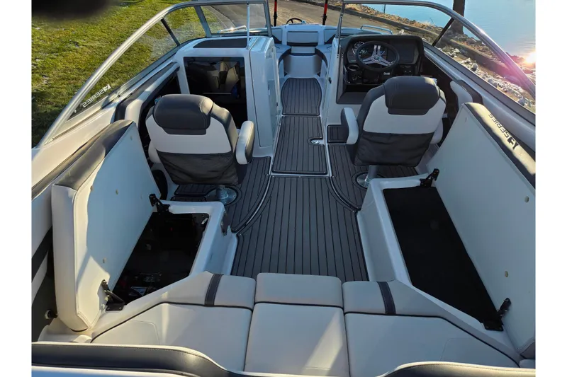 Slide: The Image of 2017 Yamaha Boats 242 Limited S E-Series interior with seating and steering wheel. - 10