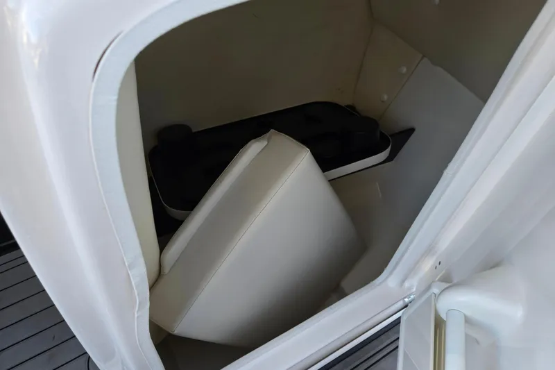 Slide: The Image of 2017 Yamaha Boats 242 Limited S E-Series interior storage compartment. - 14