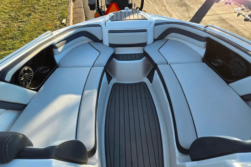 Slide: The Image of 2017 Yamaha Boats 242 Limited S E-Series interior with sleek seating and modern design. - 17