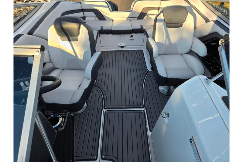 Slide: The Image of 2017 Yamaha Boats 242 Limited S E-Series interior with sleek seating and modern design. - 21