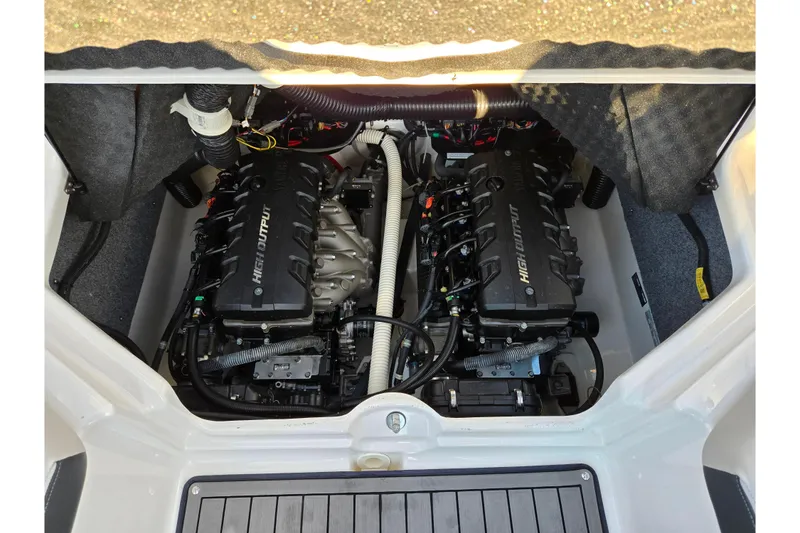 Slide: The Image of 2017 Yamaha Boats 242 Limited S E-Series engine compartment with dual high-output engines. - 23