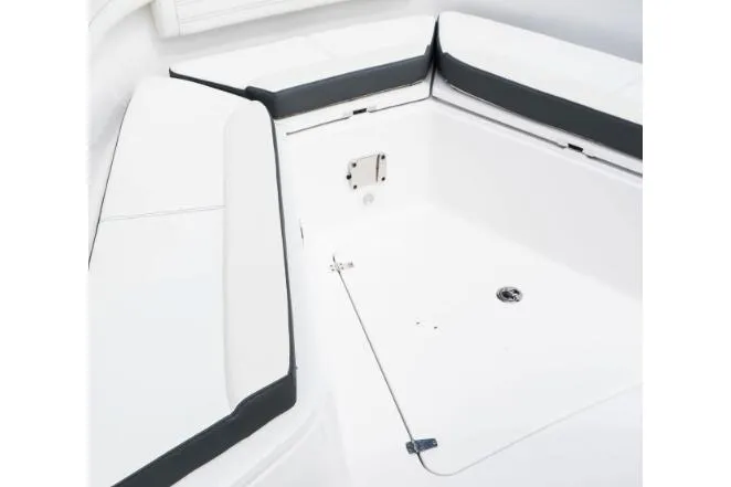 Slide: The Image of 2023 Edgewater 340CC boat interior with plush seating and modern design. - 4