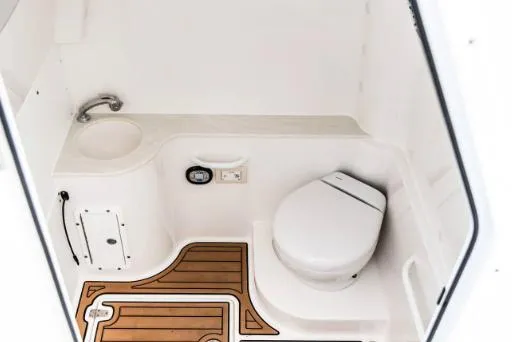 Slide: The Image of 2023 Edgewater 340CC boat interior with sleek seating and modern design. - 8