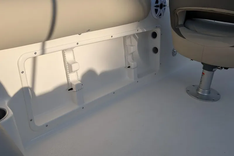 Slide: The Image of Interior of 2026 Key West 203 DFS boat, featuring seating and storage area. - 10