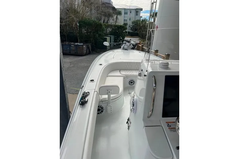 Slide: The Image of 2025 Contender 26 Bay boat deck with modern features and sleek design. - 14