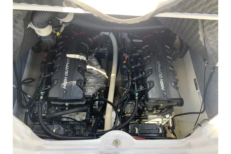 Slide: The Image of 2016 Yamaha Boats 242 Limited engine compartment with dual high output engines. - 2