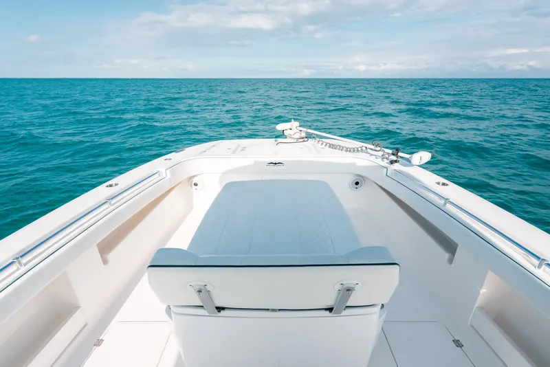 Slide: The Image of Invincible 37 Catamaran 2021 on open sea, showcasing sleek deck design and ocean view. - 15