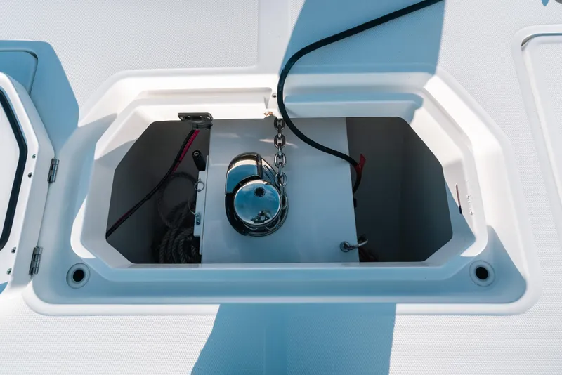 Slide: The Image of Anchor locker of 2021 Invincible 37 Catamaran with chain and rope storage. - 17