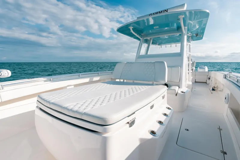 Slide: The Image of Invincible 37 Catamaran 2021 on open sea, featuring sleek design and spacious deck. - 34