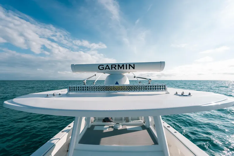 Slide: The Image of 2021 Invincible 37 Catamaran with Garmin radar on open sea. - 37