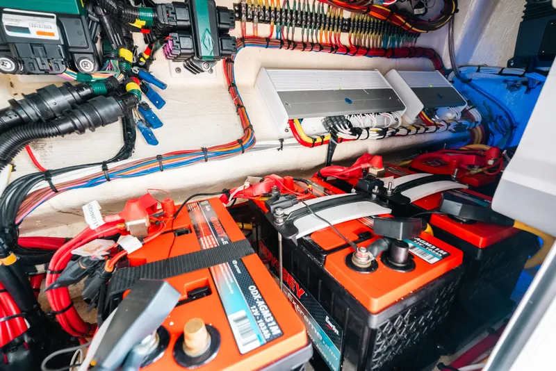 Slide: The Image of Electrical system of a 2021 Invincible 37 Catamaran with batteries and wiring. - 48