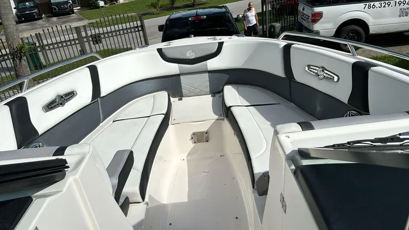 Slide: The Image of 2021 Chaparral 30 Surf boat interior with spacious seating and modern design. - 4