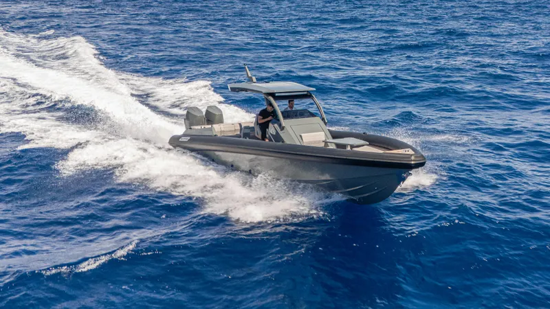 Slide: The Image of 2025 Skipper-BSK 38 boat cruising on open blue sea. - 19