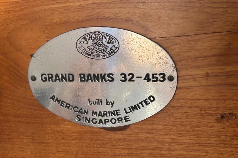 Slide: The Image of 1973 Grand Banks 32 Sedan nameplate, built by American Marine Limited, Singapore. - 39