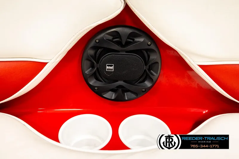 Slide: The Image of Speaker and cup holders in 2005 Crownline 225 LPX boat interior, red and white design. - 35
