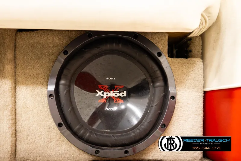 Slide: The Image of Sony Xplod subwoofer in 2005 Crownline 225 LPX boat interior. - 38