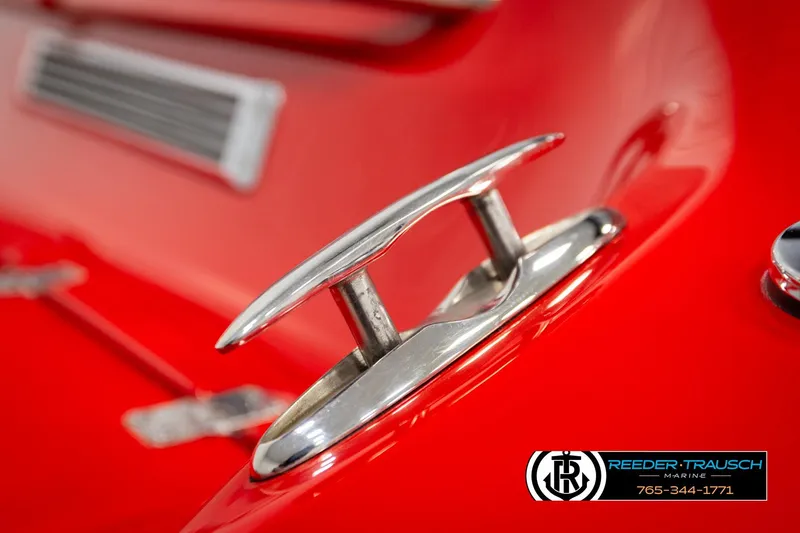 Slide: The Image of Red 2005 Crownline 225 LPX boat with chrome cleat detail. - 48