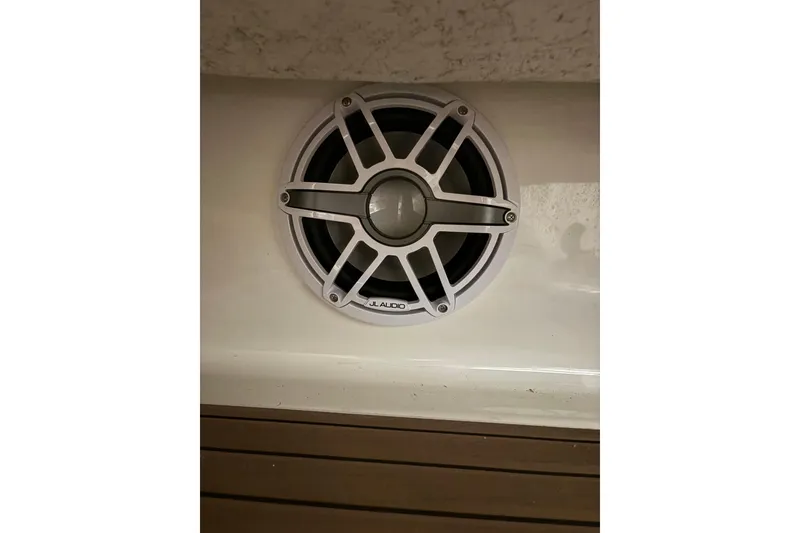Slide: The Image of JL Audio speaker on 2004 Sea Ray 380 Sundancer boat interior. - 20