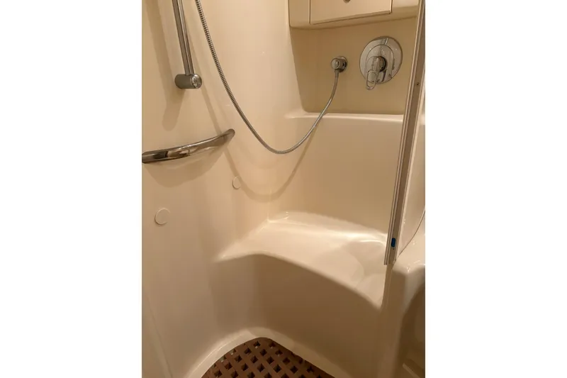 Slide: The Image of Shower area in 2004 Sea Ray 380 Sundancer yacht with handheld showerhead. - 33