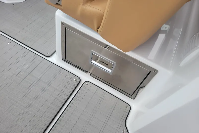 Slide: The Image of 2026 Four Winns H33 OB boat interior with Dometic storage compartment. - 23