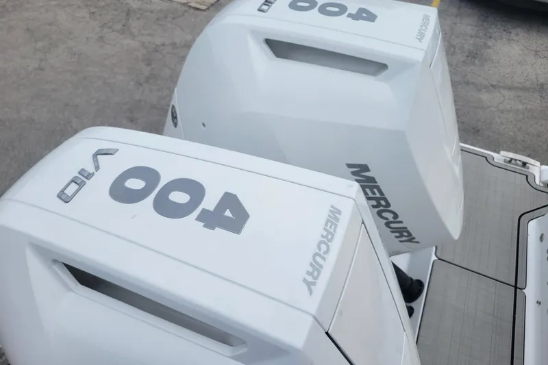 Slide: The Image of Twin Mercury 400 outboard engines on 2026 Four Winns H33 OB boat. - 4