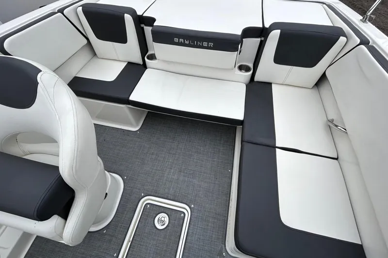 Slide: The Image of 2021 Bayliner VR4 Bowrider I/O interior with sleek seating and modern design. - 2