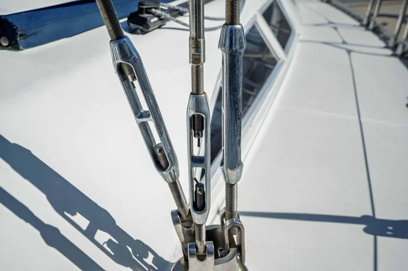 Slide: The Image of Close-up of rigging on a 2003 Jeanneau Sun Odyssey 45.2 sailboat deck. - 11